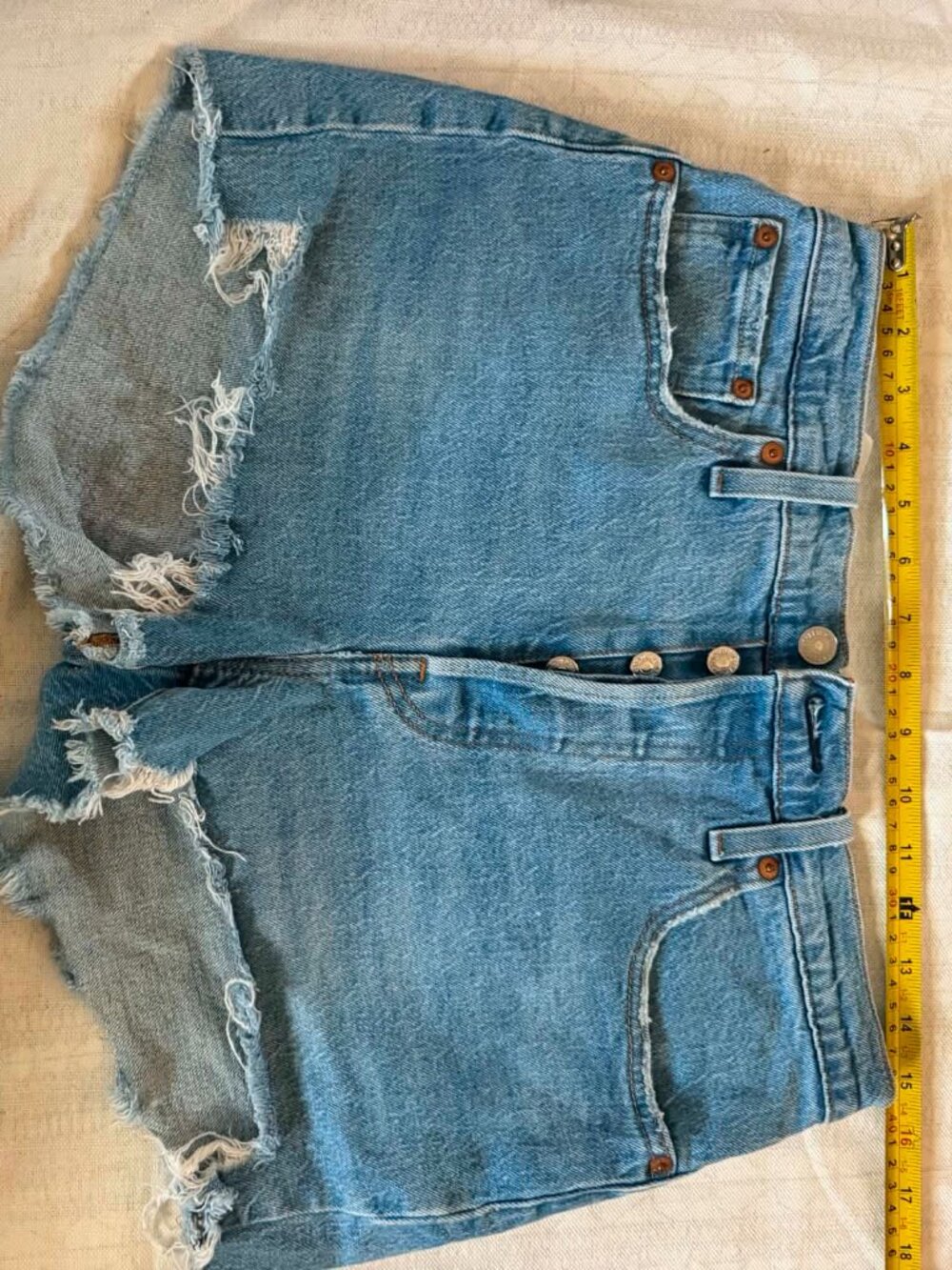 Levi’s 501 Original High Rise Distressed Cutoff Denim Shorts Light Wash